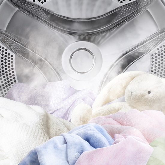 Internal view of all-in-one washer dryer showing steam wash stain removal