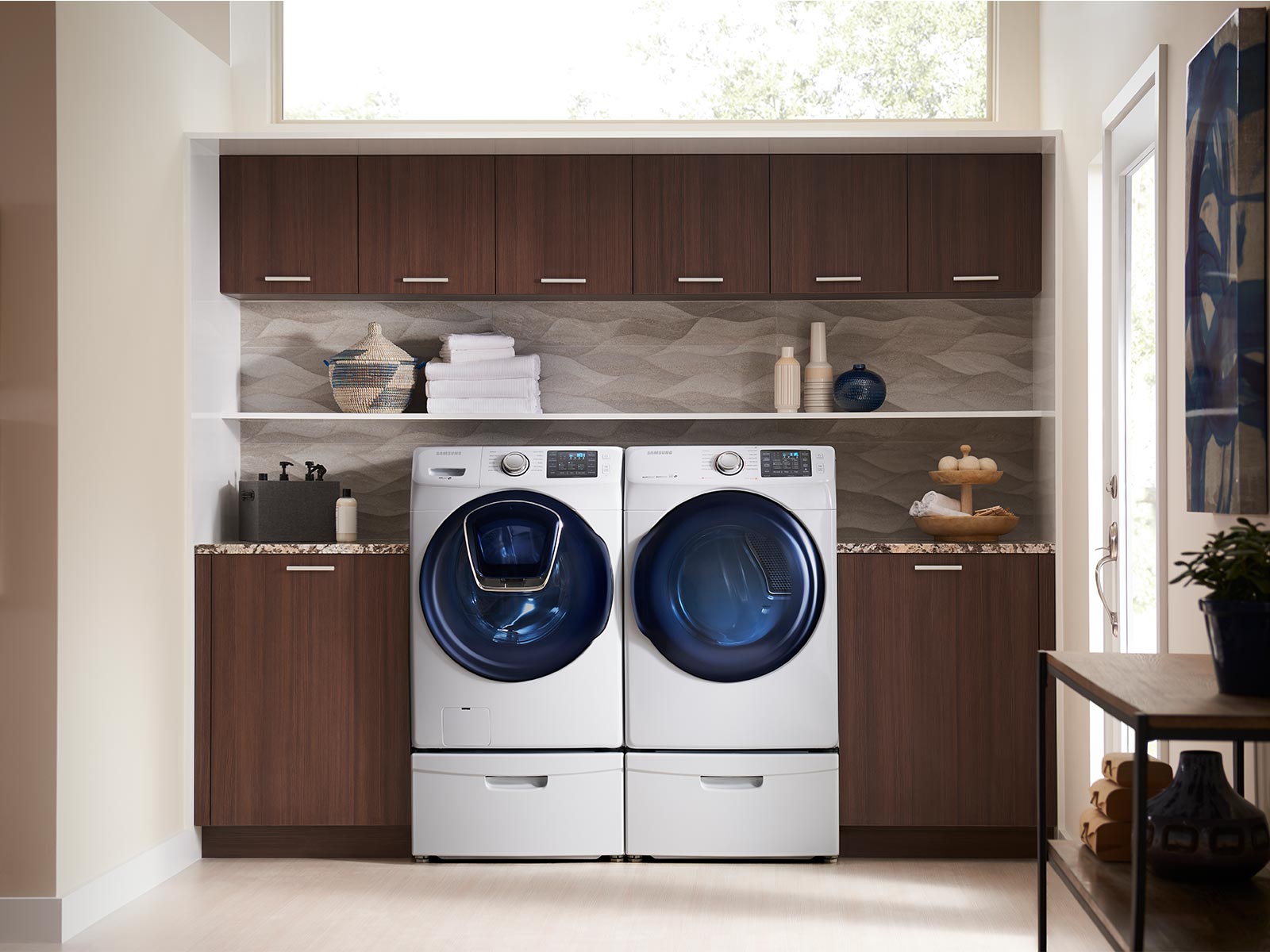 https://image-us.samsung.com/SamsungUS/home/home-appliances/home-appliances-accessories/washers-and-dryers/pd/we357a0w/05_Pedestal_WE357A0W_Lifestyle_Laundry-Room_Pedestal_Add_Wash_White.jpg?$product-details-jpg$