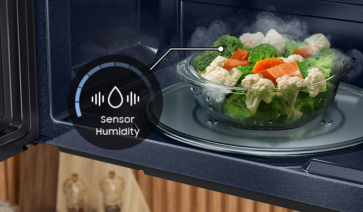 Steamed mixed vegetables inside Samsung Over the Range Microwave