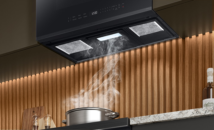 Pot boiling with steam going into Samsung Over the Range vent