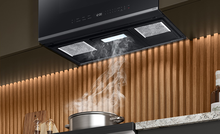 Pot boiling with steam going into Samsung Over the Range vent