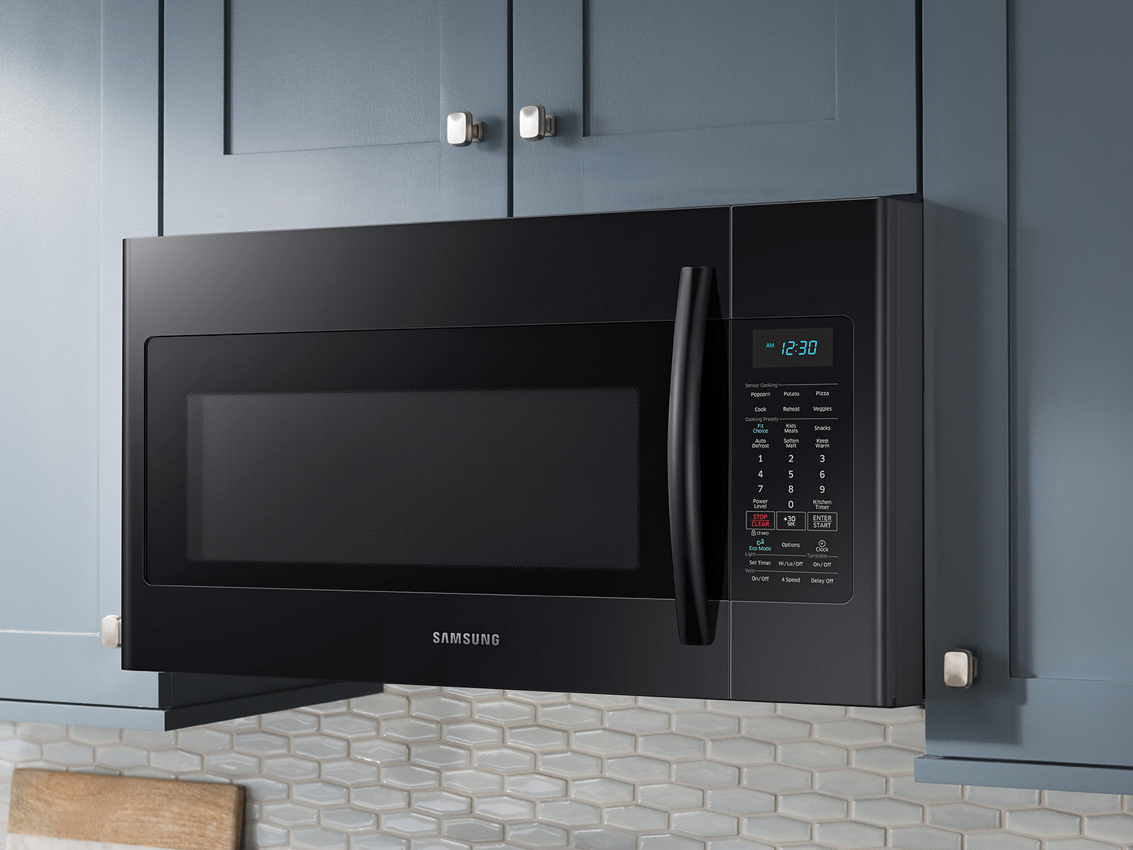 ME18H704SFG by Samsung - 1.8 cu. ft. Over-the-Range Microwave with Sensor  Cooking in Fingerprint Resistant Black Stainless Steel