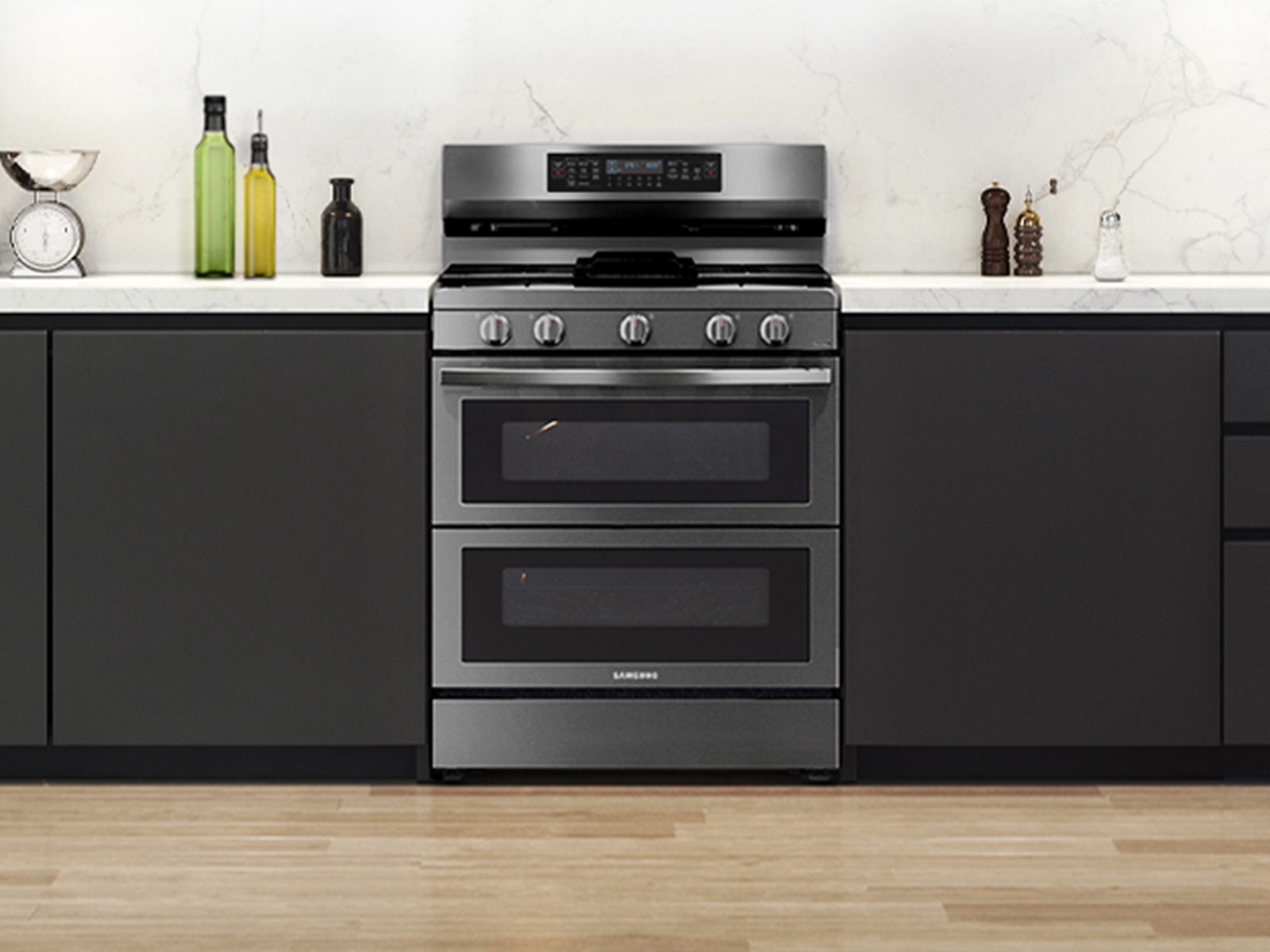 Whirlpool 6.0 Cu. Ft. Gas Double Oven Range with Center Oval Burner in  Stainless Steel