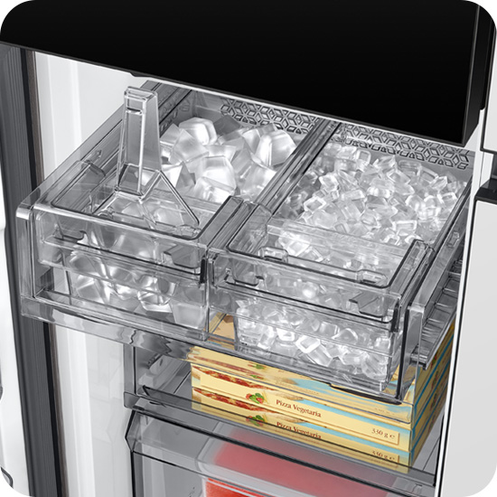 Inside Samsung Bespoke refrigerator with open dual ice maker trays