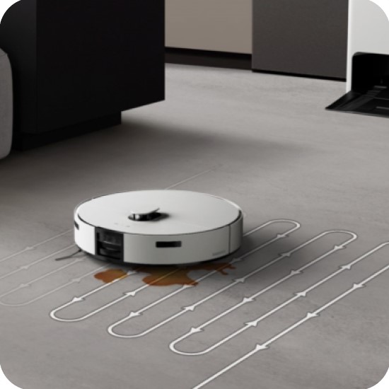 White Bespoke Jet Bot AI Robot Vacuum & Mop combo cleaning floor in a pattern