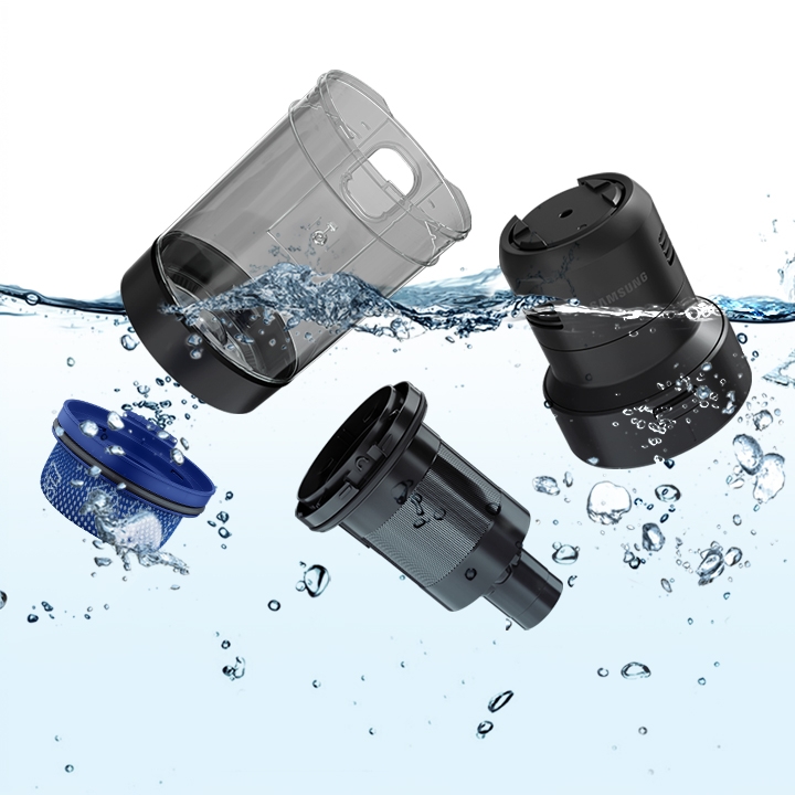 Washable vacuum dustbin and vacuum filters being cleaned in water