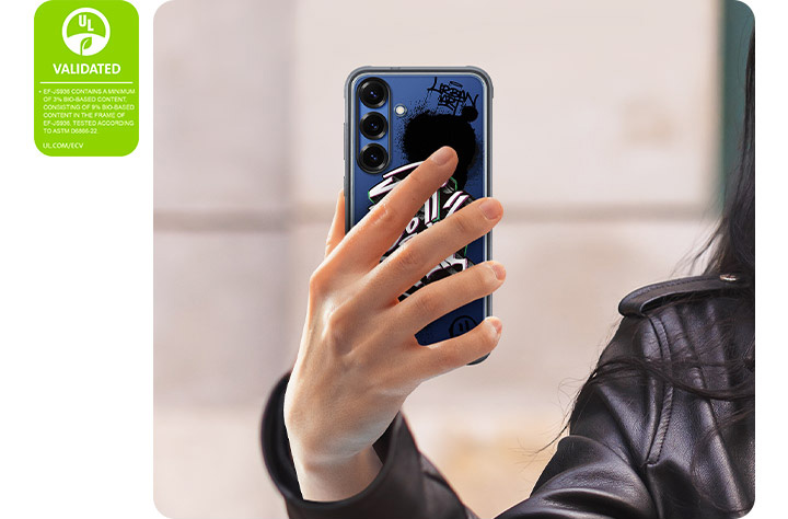 A person holds up the Rugged Case installed on a Galaxy S25. The phone is seen from the back, with hands gripping along the case's patterns. To the left, a UL Environmental Claim Validation Mark is shown that reads 'EF-JS931 CONTAINS A MINIMUM OF 3% BIO-BASED CONTENT, CONSISTING OF 9% BIO-BASED CONTENT IN THE FRAME OF EF-JS931, TESTED ACCORDING TO ASTM D6866-22. UL.COM/ECV'.