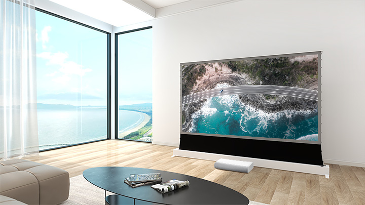 The Samsung Rollable Screen for Premiere Projector in a bright lit room