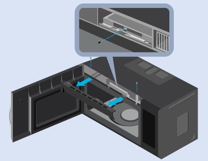 The vent being removed from a microwave