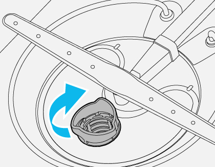 Illustration showing a filter in a dishwasher with an arrow indicating a clockwise movement