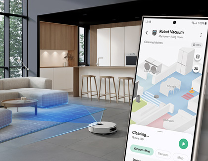 Samsung Jet Bot Vacuum scanning the room, with a Galaxy phone displaying the room coverage inside the SmartThings app