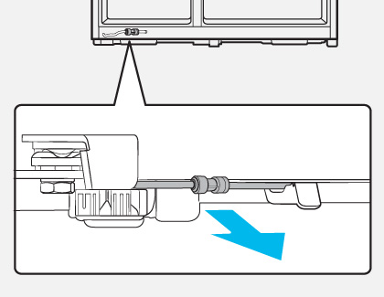 Diagram of the bottom rear side of the fridge with an arrow indicating outwards to pull out the water line