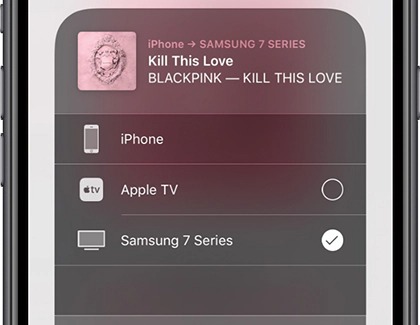iPhone screen displaying the AirPlay interface with 'Samsung 7 Series' selected for screen mirroring. The interface shows 'Kill This Love - BLACKPINK' playing, with options to connect to other devices like Apple TV visible.
