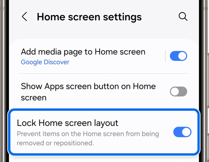 Galaxy phone screen displaying 'Home screen settings' with the option 'Lock Home screen layout' toggled on to prevent repositioning of icons