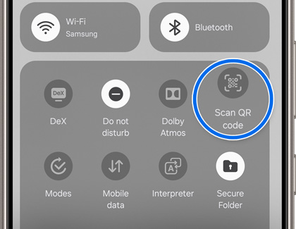 Galaxy phone's quick settings panel displaying various options, with 'Scan QR code' feature highlighted in a circle