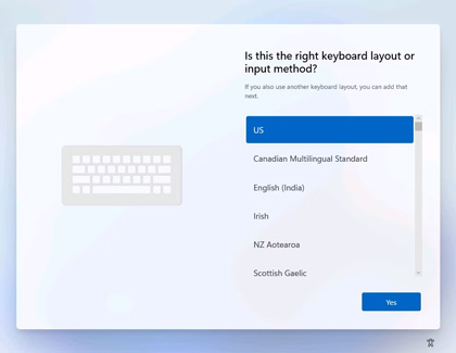 Screen showing keyboard layout options during the initial setup of a Samsung Galaxy Book, with options including US, Canadian Multilingual Standard, English (India), Irish, NZ Aotearoa, and Scottish Gaelic.