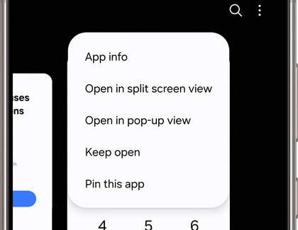 Galaxy phone screen displaying an app menu with options such as 'Open in split screen view,' 'Open in pop-up view,' 'Keep open,' and 'Pin this app.