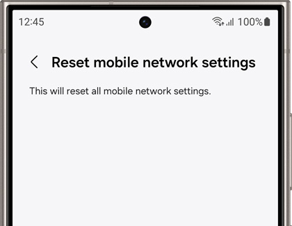 Screen of a Galaxy phone displaying a message 'Reset mobile network settings' with a note that this will reset all mobile network settings.