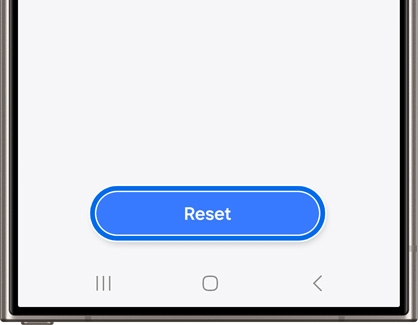 Galaxy phone screen displaying a prominent blue 'Reset' button centered at the bottom, with a simple white background and navigation buttons visible below.