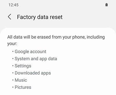 Screen display of a factory data reset warning on a Galaxy device, listing data that will be erased including the Google account, system and app data, settings, downloaded apps, music, and pictures.