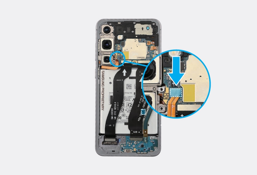 Magnified view showing the connection point for the upper flex cable onto the main circuit board.