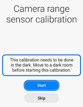 Camera range sensor calibration screen showing a highlighted instruction box regarding dark room calibration, with Start and Skip buttons below.