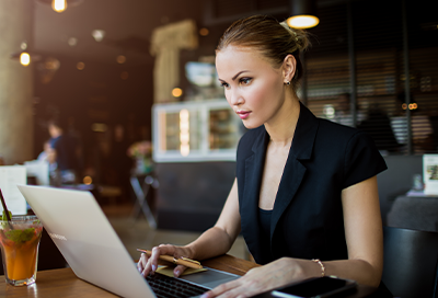 Woman typing on laptop
