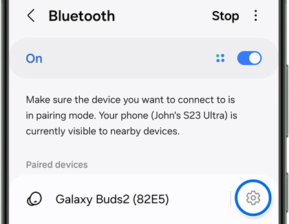 Settings icon highlighted next to a bluetooth device