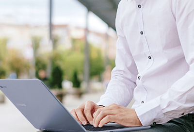 Man looking at settings on a Samsung Chromebook