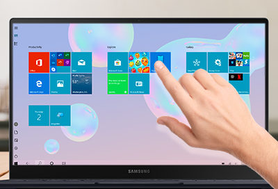 A hand trying to use a touchscreen on a Samsung PC