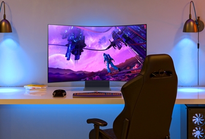 Odyssey Ark Gaming Screen setup on a computer desk