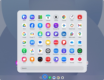 A Samsung DeX desktop interface showing an open app drawer with a grid of various application icons and a search bar at the bottom.