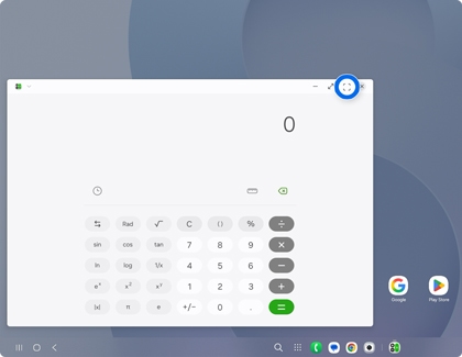A Samsung DeX screen showing a Calculator window with the expand to full screen icon highlighted by a blue circle in the top right corner.