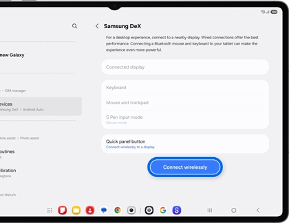 A Galaxy tablet showing the Samsung DeX settings page with the Connect wirelessly button highlighted by a blue rounded box.
