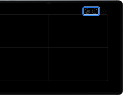 A Galaxy tablet showing a black screen with two small icons in the top right corner highlighted by a blue rounded box.