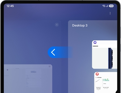 A Galaxy tablet showing a blue back arrow icon in the center of the screen while switching between workspaces.