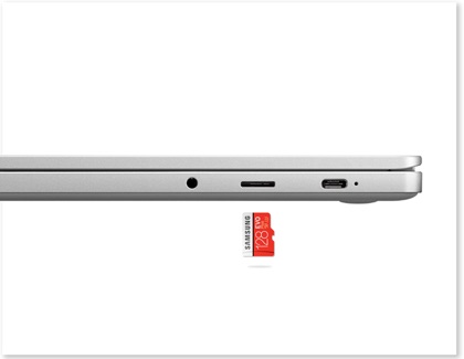 SD Card being removed from the laptop.