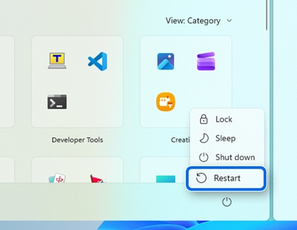 Windows Start menu power options with Restart outlined in blue.