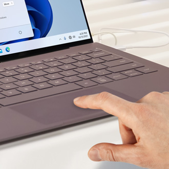 Person using touchpad on Galaxy Book S