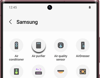 A Samsung phone screen displaying the SmartThings app with the Air purifier option highlighted.