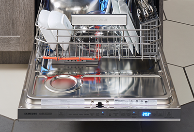 Samsung dishwasher with the door open and the lower rack partly pulled out