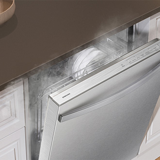 Samsung dishwasher door slightly open, revealing steam and dishes