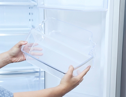 Remove a refrigerator door bin