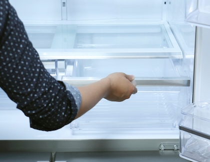 Removing a refrigerator crisper drawer