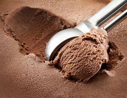 Chocolate ice cream being scooped