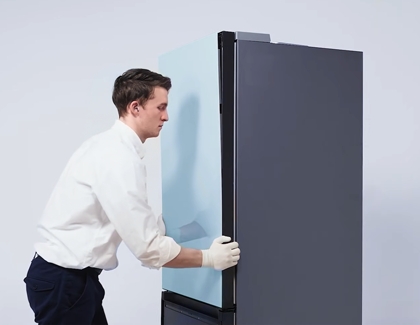 Person pushing the panels into place