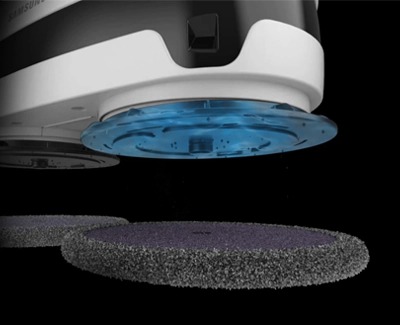 A mop pad being detached from a Samsung Jetbot Mop