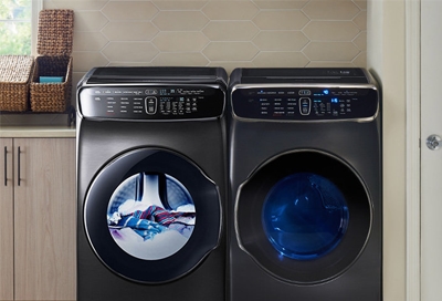 A Samsung washing machine next to a Samsung dryer