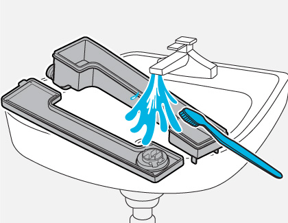 Illustration of Auto detergent and Auto softener drawer being cleaned