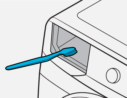 Illustration showing a toothbrush being used to clean the auto dispenser detergent drawer slot in a washing machine.